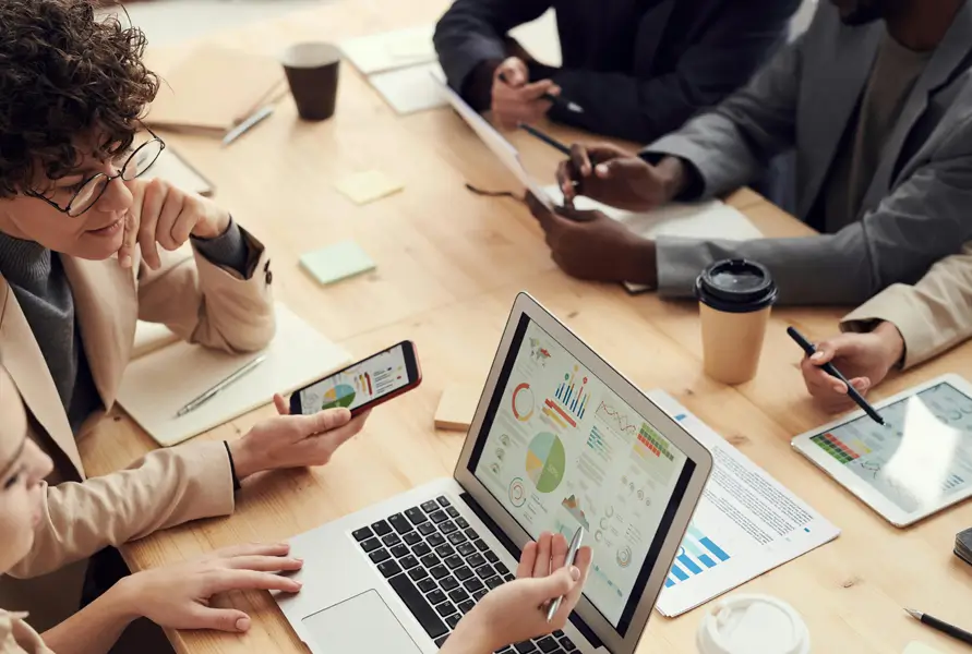 Office desk with laptops - meeting